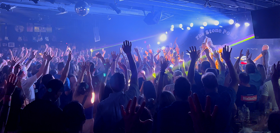 Tramps Like Us live concert crowd photo