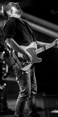 Tramps Like Us frontman Mark Salore live performance photo